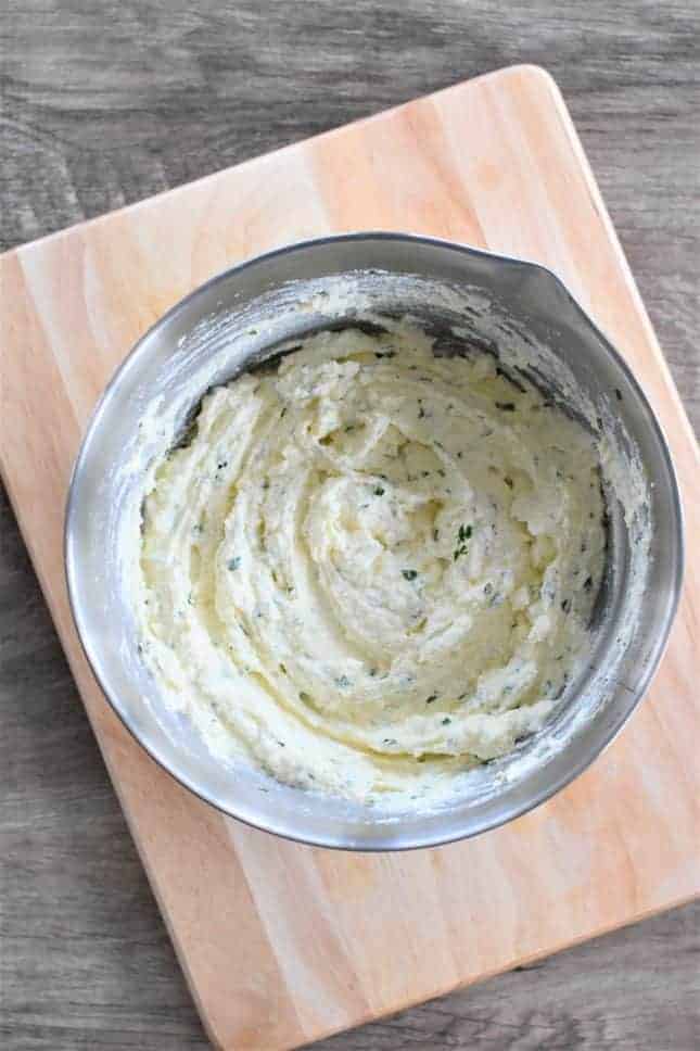 Ricotta cheese mixture in a mixing bowl