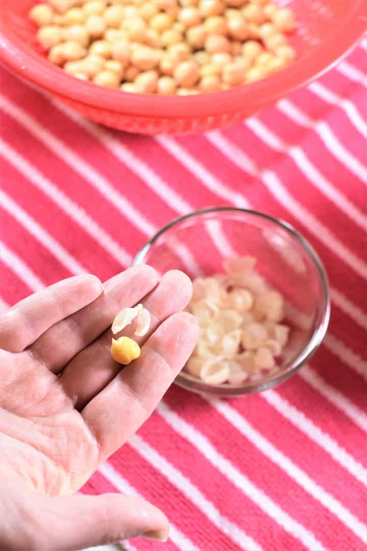 Removing the skin from a chickpea