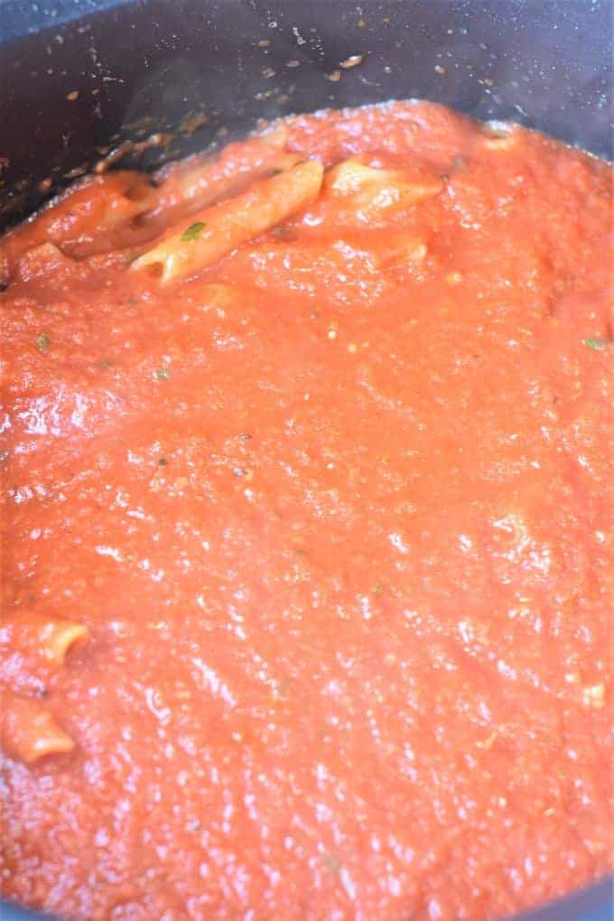 Penne pasta and tomato sauce in a pot