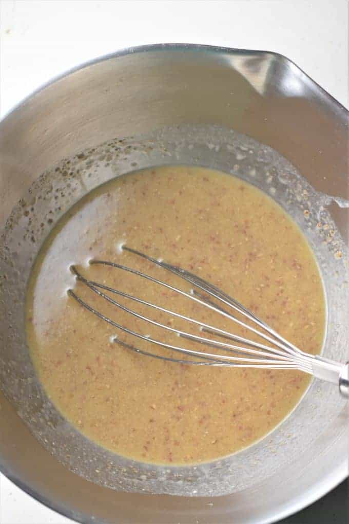 wet Ingredients in a mixing bowl with a whisk