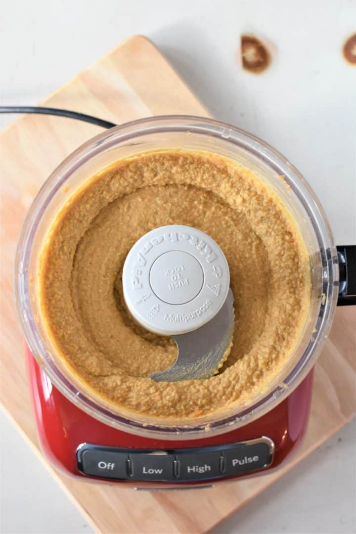 Green olive and pimento hummus in a food processor