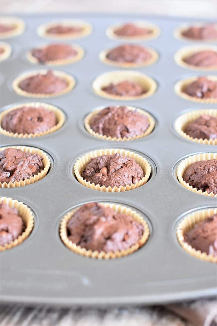 front view of brownie bites in a muffin tin after baking
