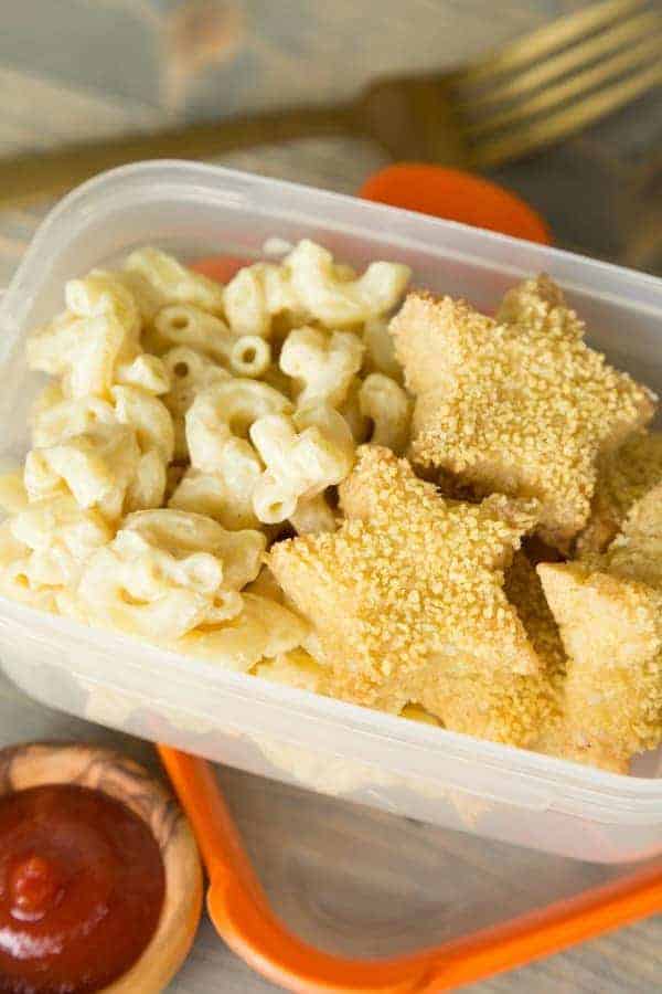 Star nuggets with mac and cheese in a lunch container