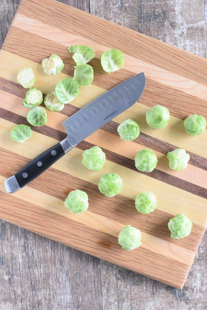 Stems cut off Brussels sprouts with some leaves removed