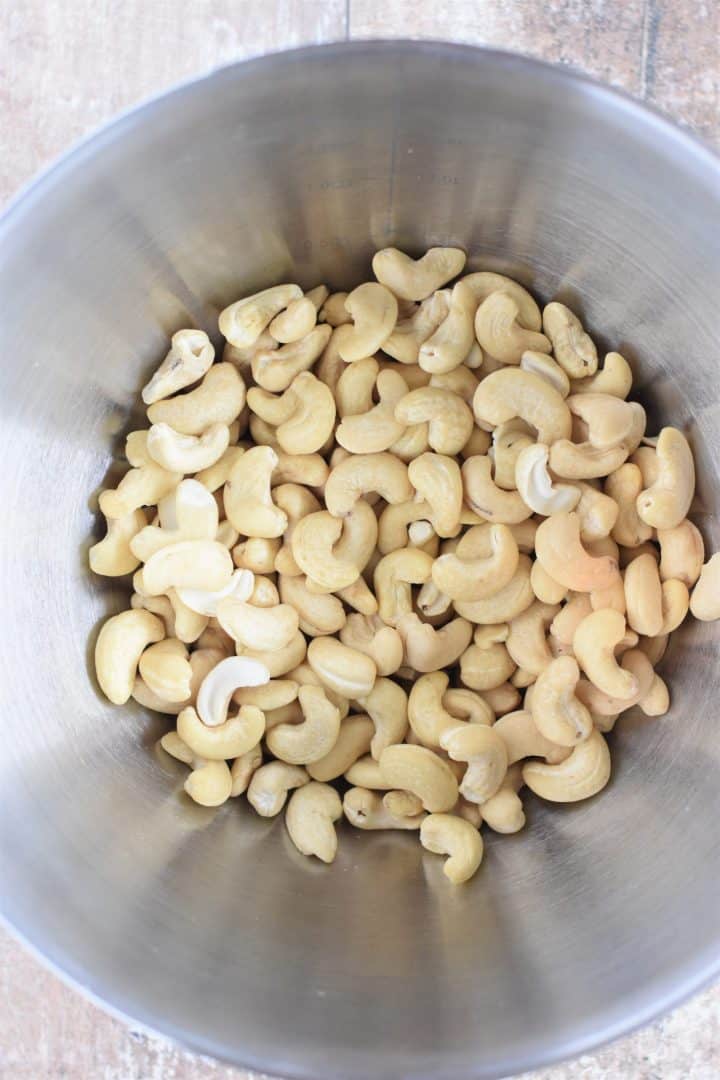 Raw cashews in a mixing bowl