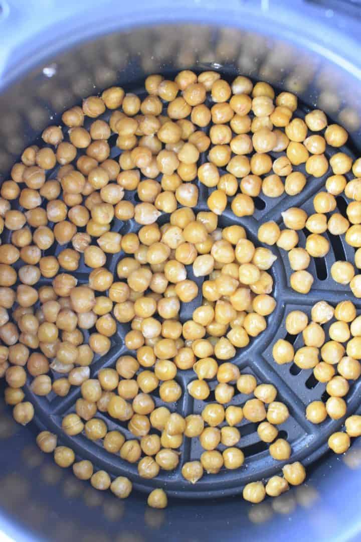 Chickpeas in the air fryer after being cooked for 6 minutes