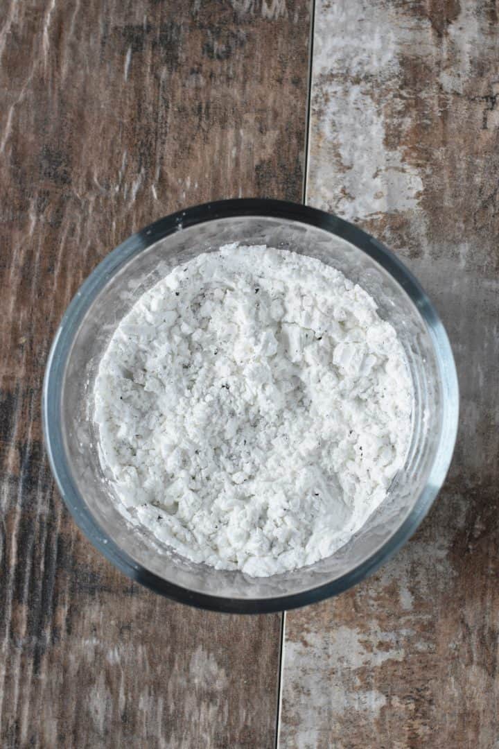 Cornstarch, salt and pepper mixed together in small bowl