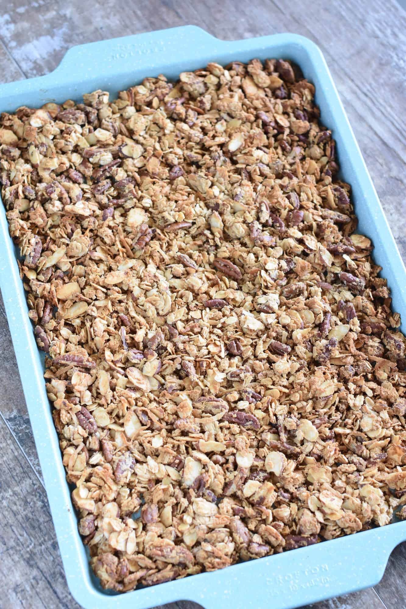 baked granola on baking sheet