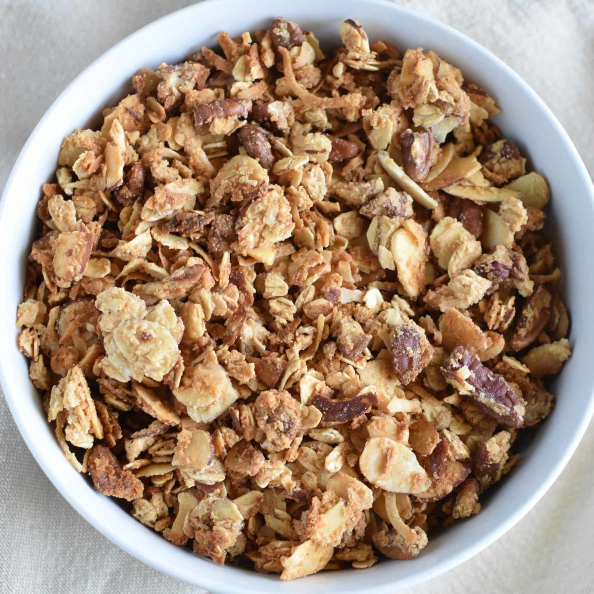overhead of gluten-free granola in a white bowl
