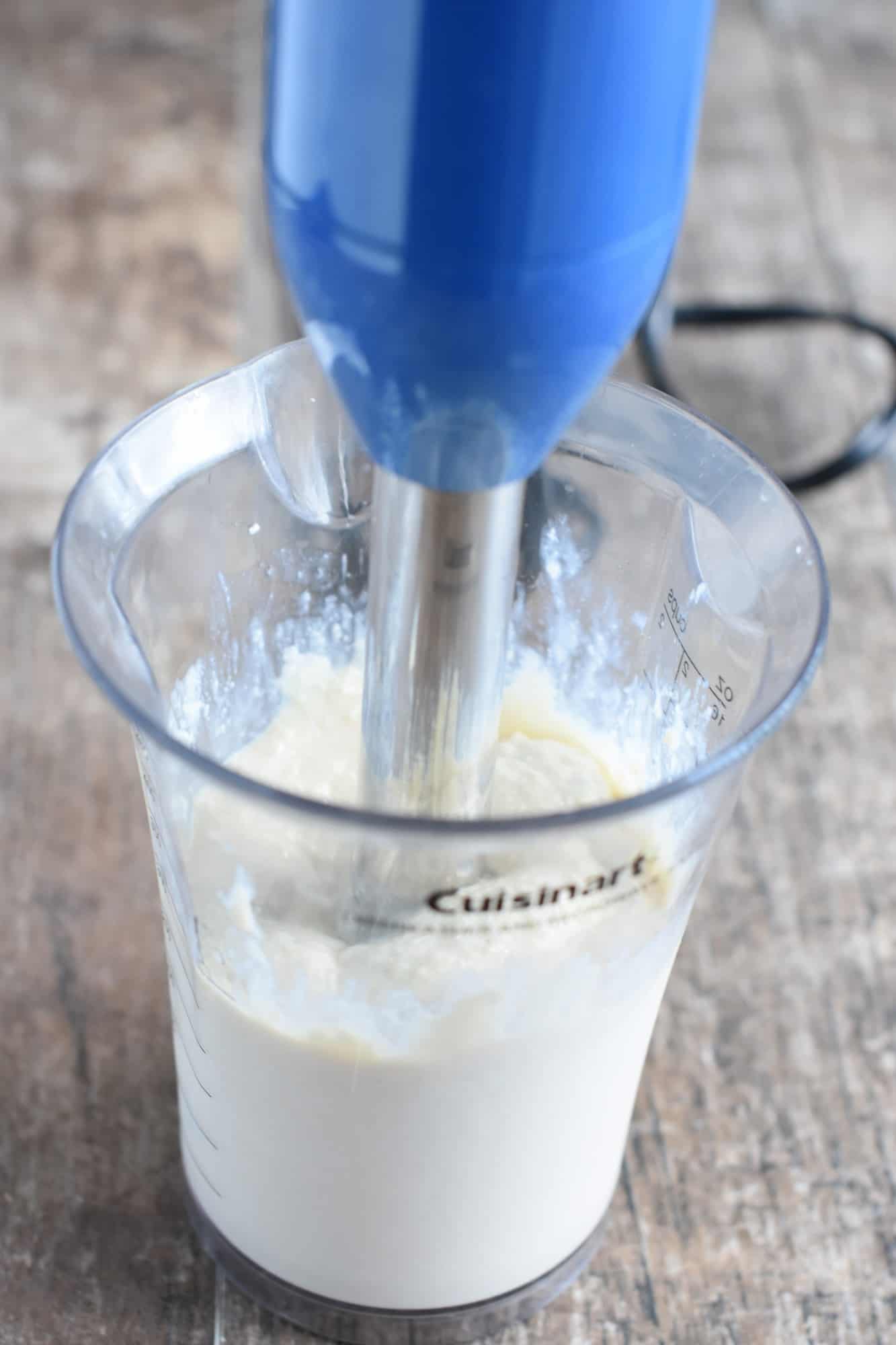 blending the tofu mixture with the immersion blender