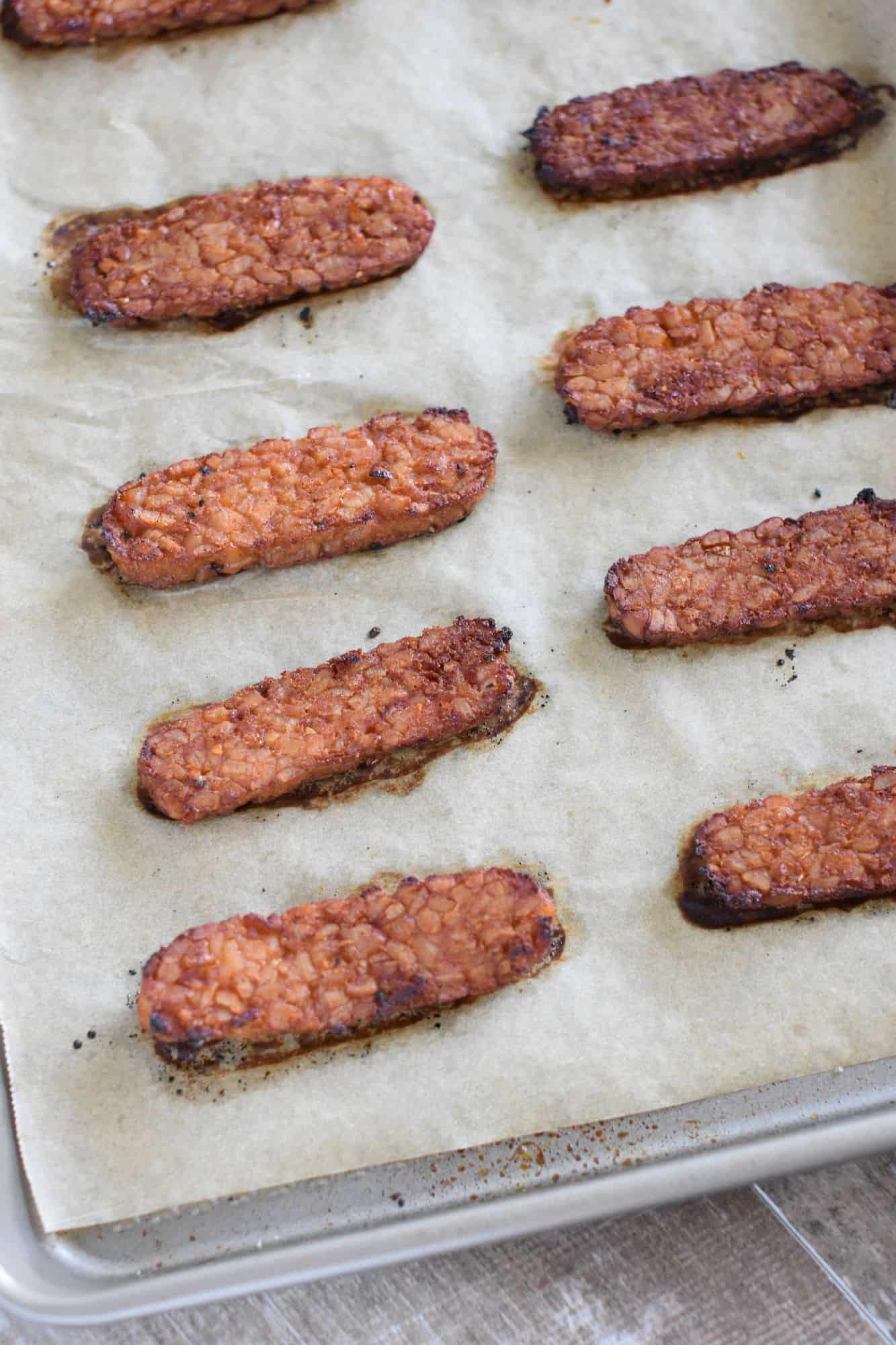 tempeh strips on baking sheet after being cooked