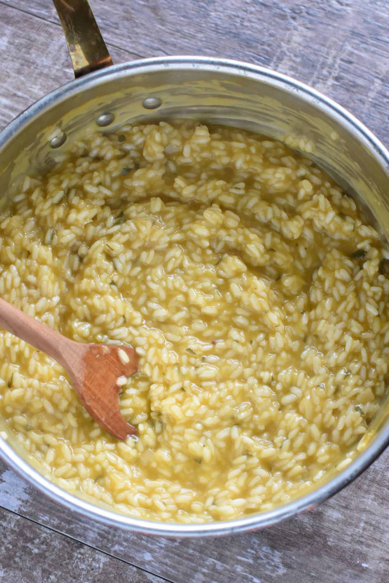 Risotto in pan after adding broth and stirring until creamy
