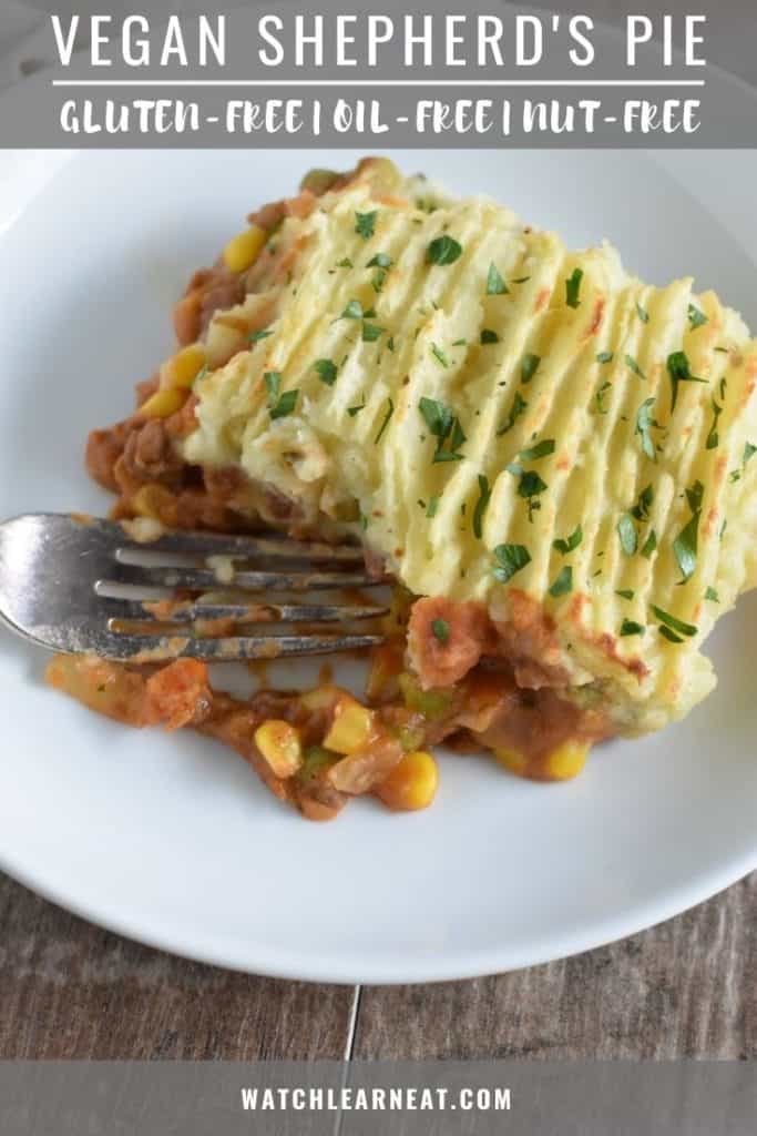 pin showing slice of shepherd's pie with a fork in it
