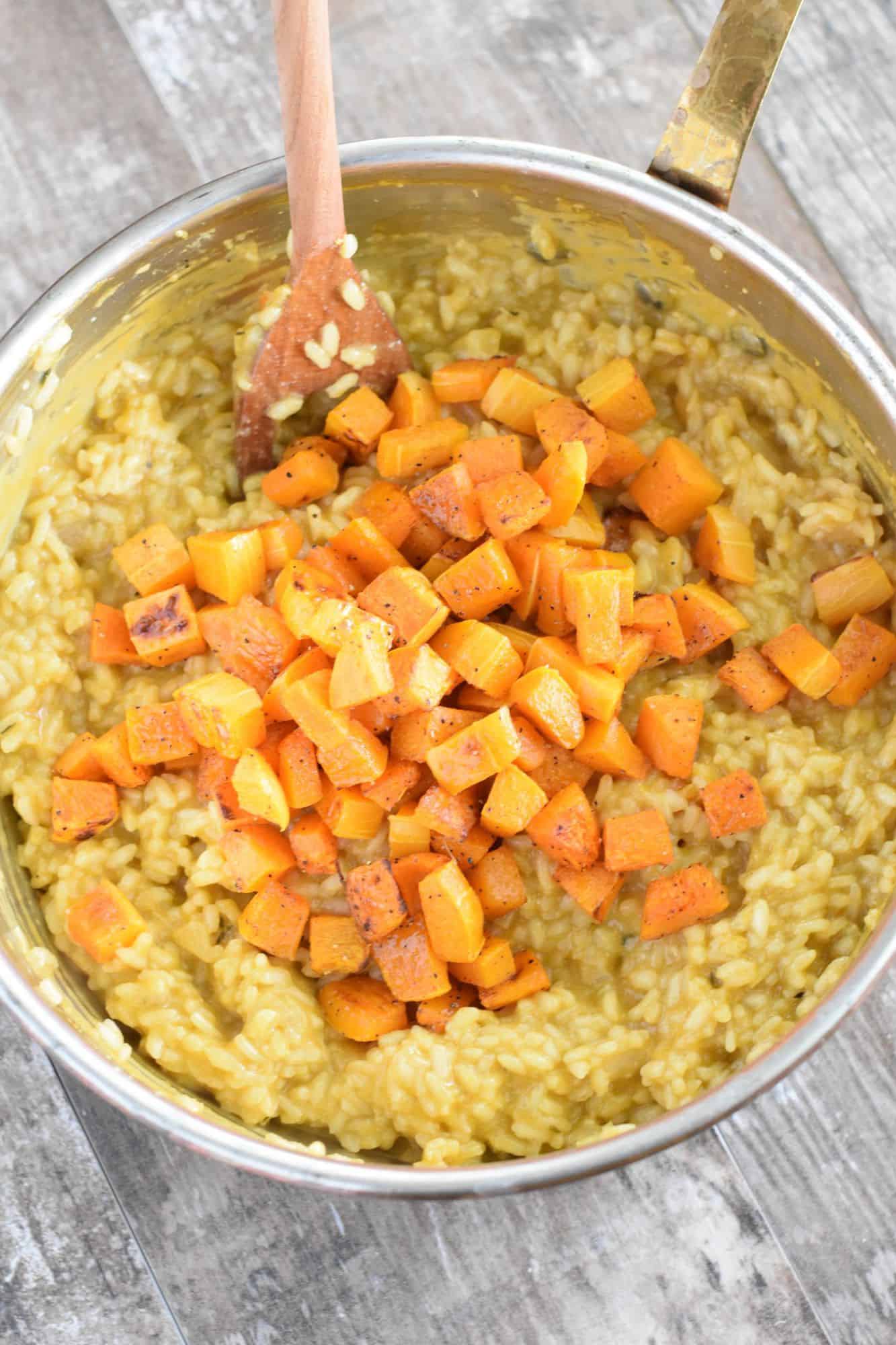 butternut squash added to the risotto in the pan