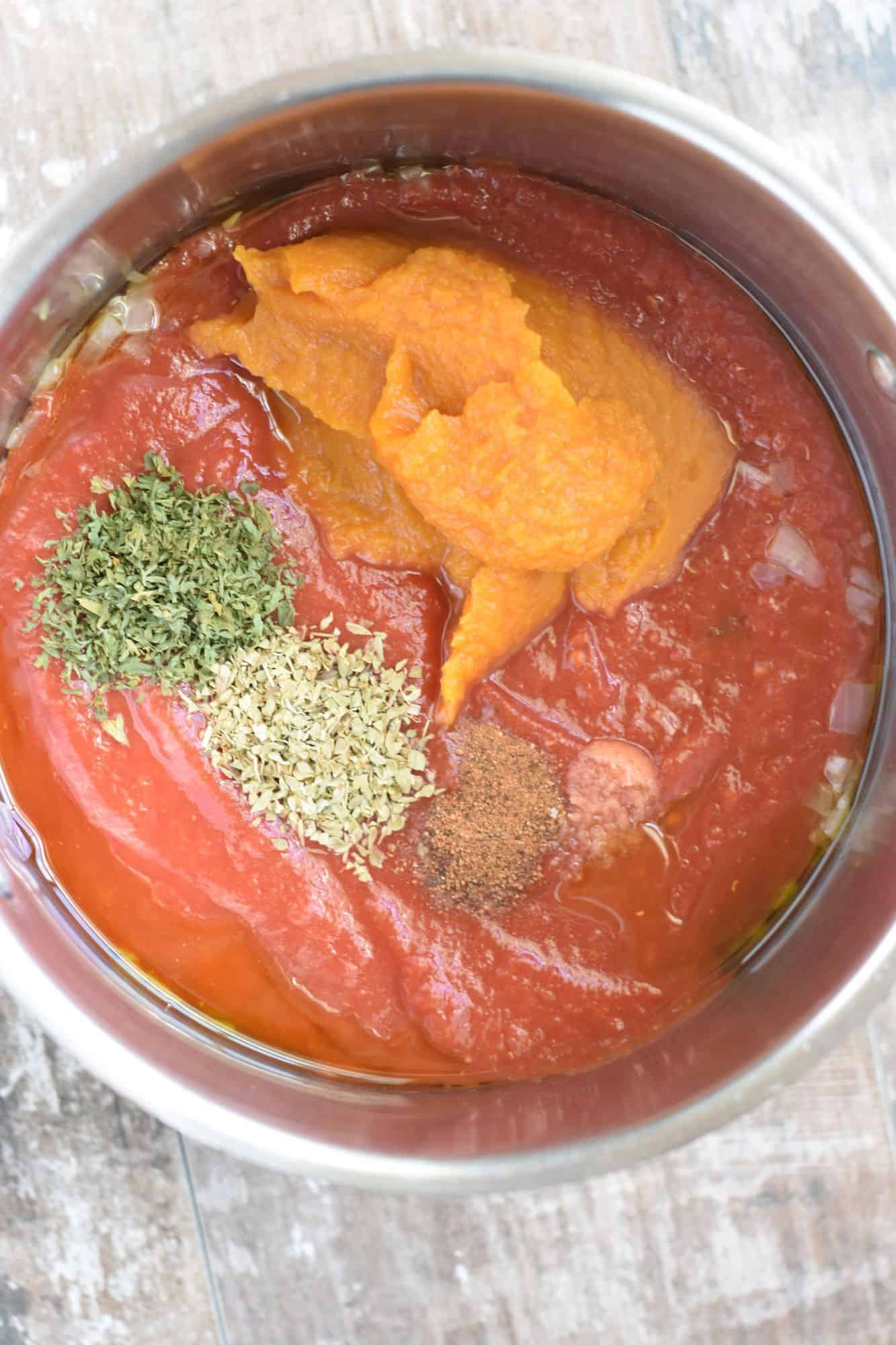 ingredients for making the sauce in a pot before being mixed together