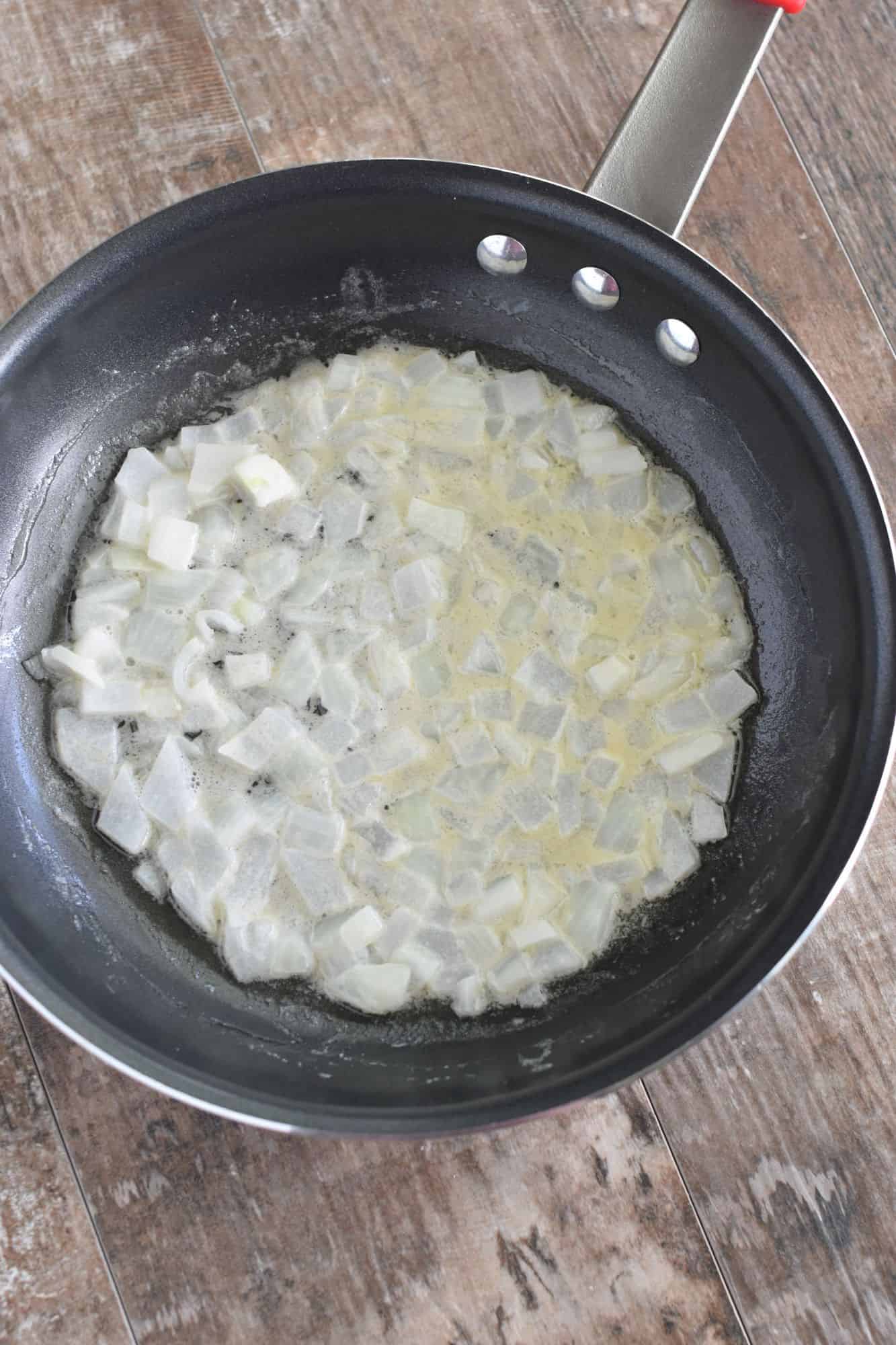 Cooking onion in vegan butter in a non-stick pan
