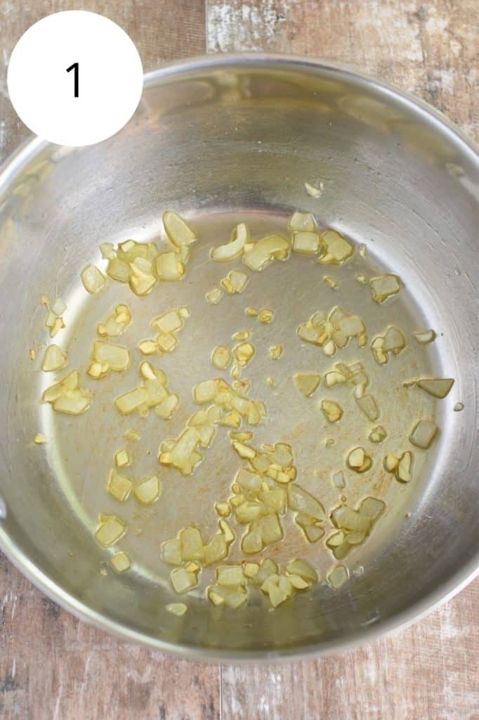 onion and garlic cooking in olive oil in soup pot