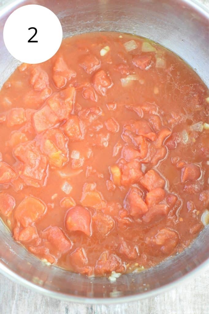 diced tomatoes added to the soup pot