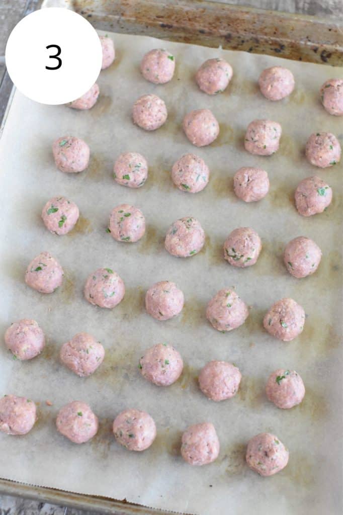 uncooked vegan meatballs on baking sheet