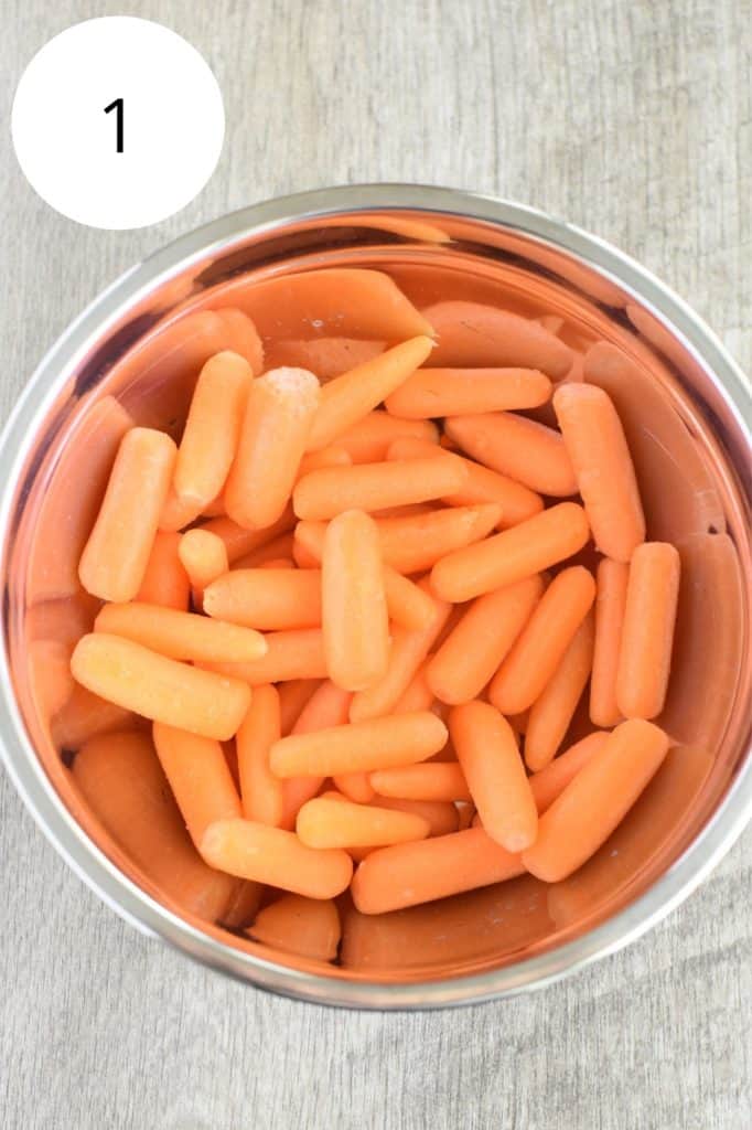 baby carrots in a mixing bowl