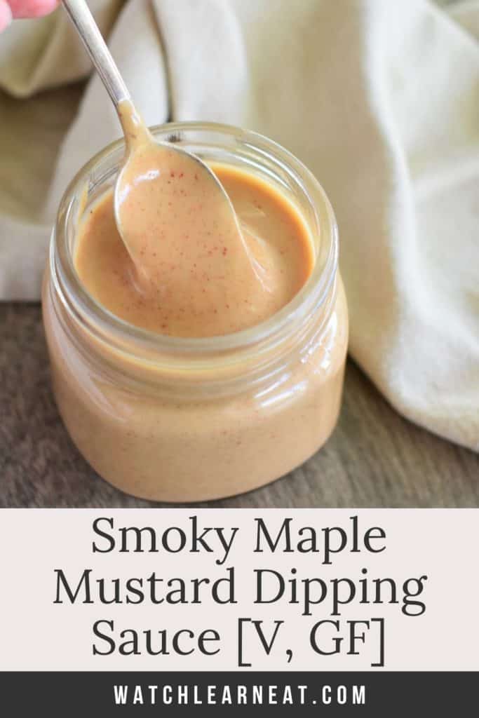 pin showing dipping sauce in a mason jar with an spoon