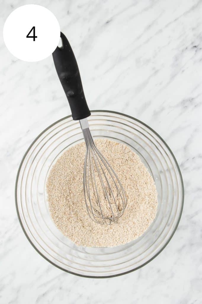 oat flour mixture after being combined with a whisk in a mixing bowl
