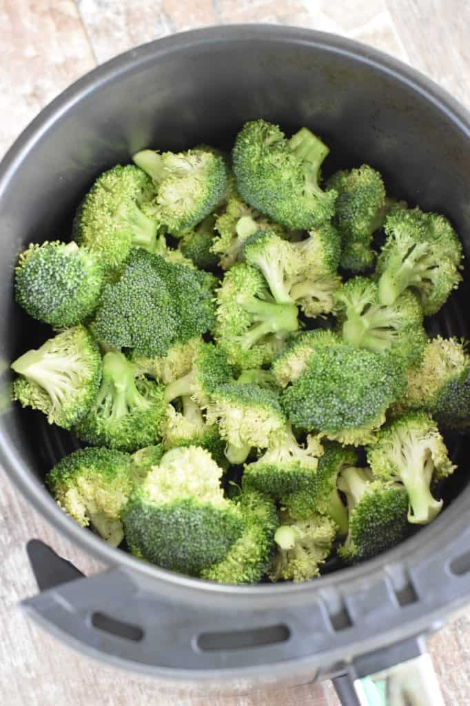 broccoli florets added to air fryer basket