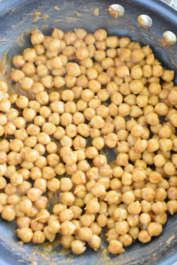 chickpeas done cooking in pan after sauce has reduced