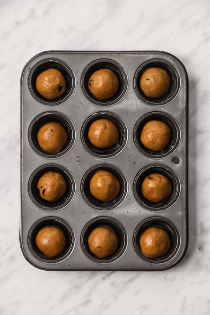 dough balls in mini muffin tin