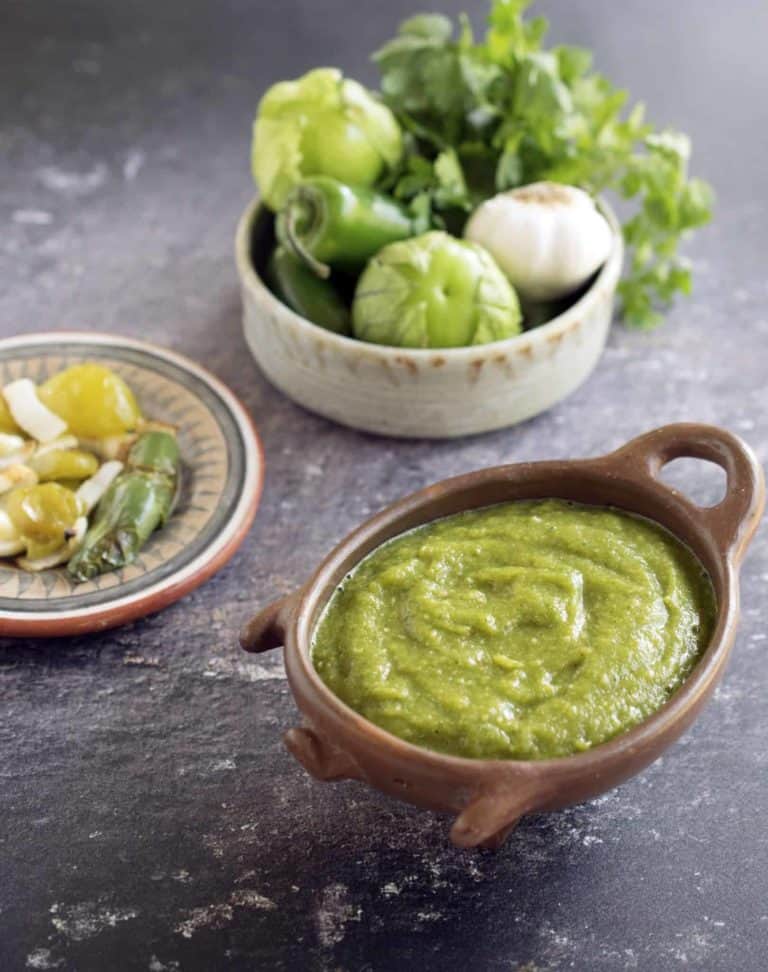 salsa verde in serving dish with ingredients around