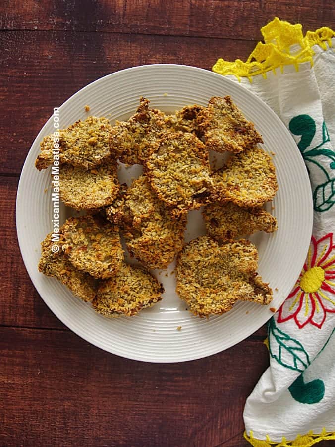 overhead of vegan fried "chicken" pieces on a white plate