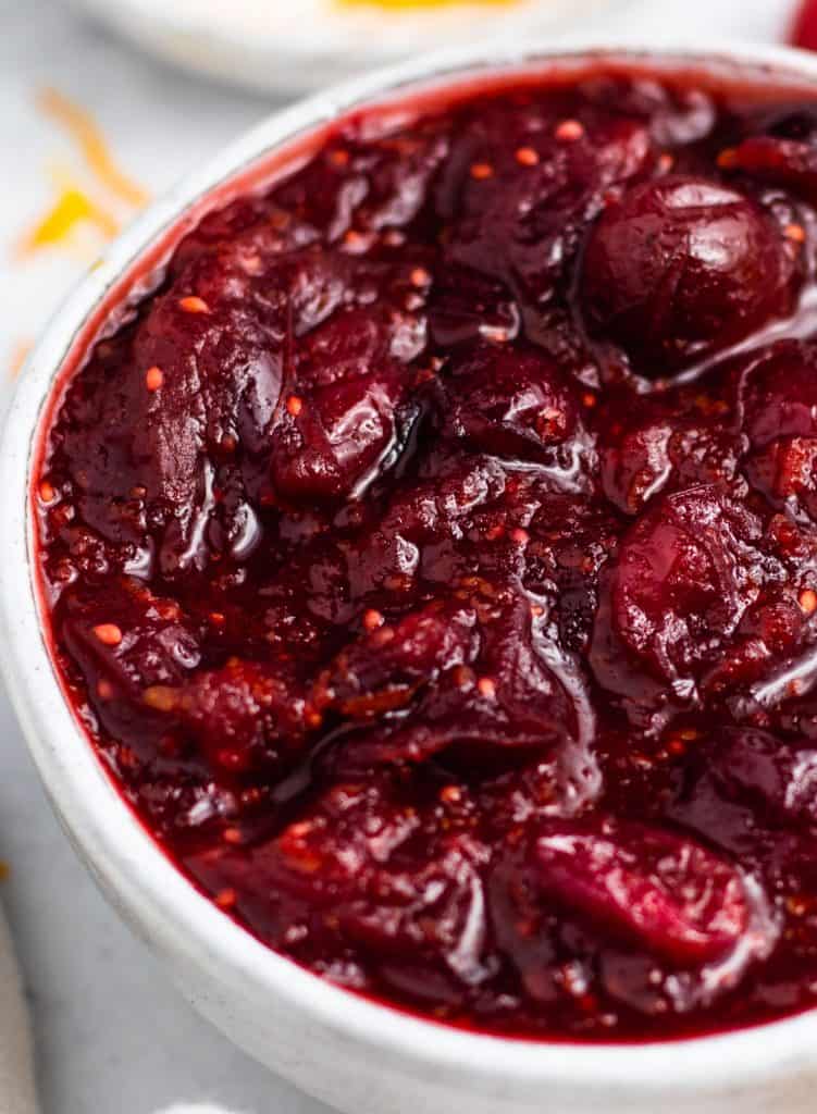close-up overhead of cranberry sauce in serving bowl