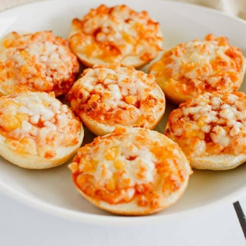 close-up front view of bagel bites on white plate