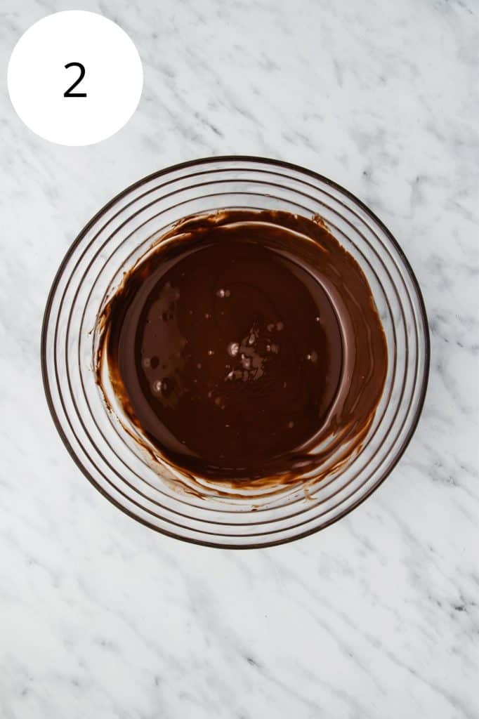 chocolate in mixing bowl after melting with coconut oil