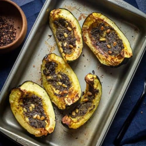 air fryer acorn squash after cooking in baking pan