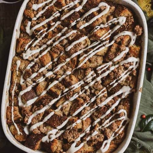 overhead of French toast casserole in baking dish with icing on top.