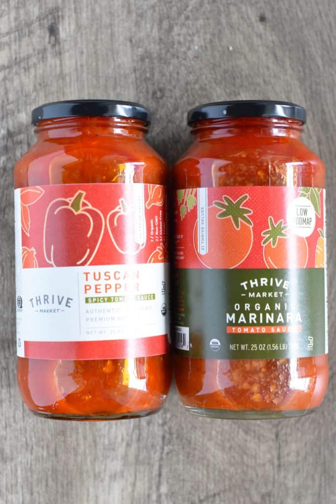 overhead of two jars of Thrive Market tomato and marinara sauce