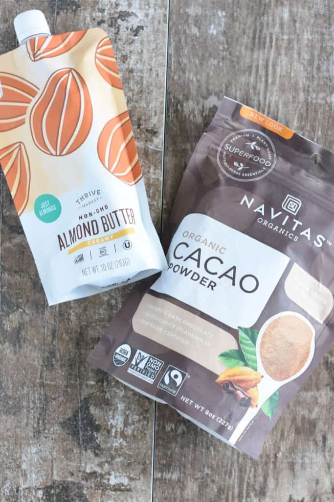 overhead of Thrive Market almond butter and Navitas cacao powder