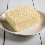 Front view of tofu on a plate.