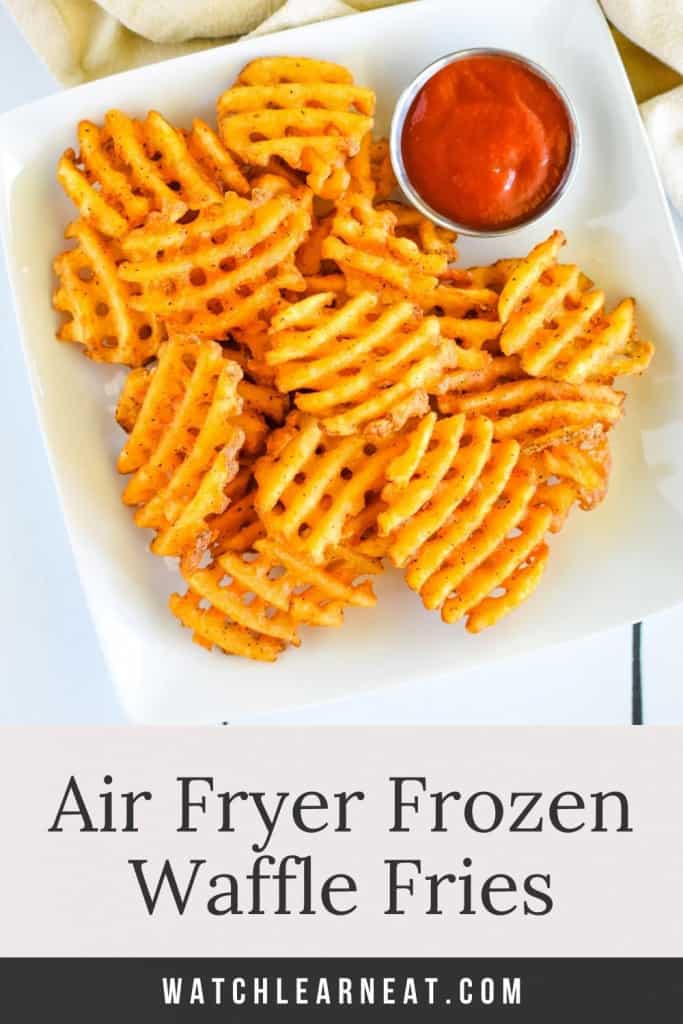 Pin showing waffle fries on a plate with text title overlay.
