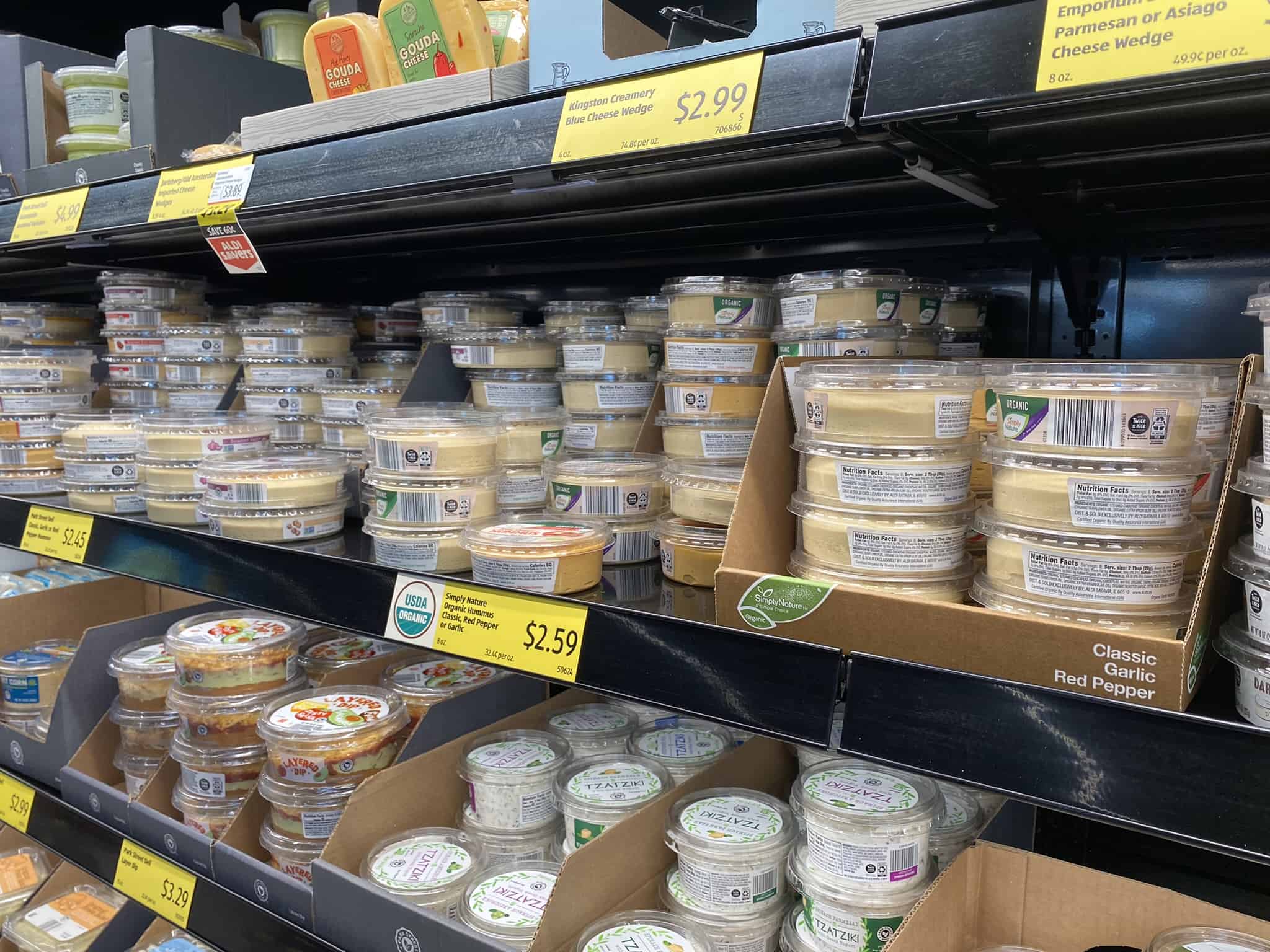Hummus on shelves in Aldi.