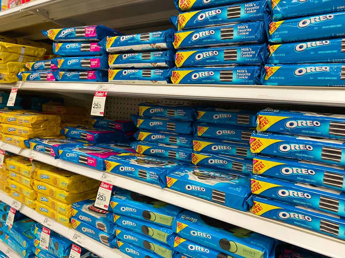 Packs of Oreos on supermarket shelves.