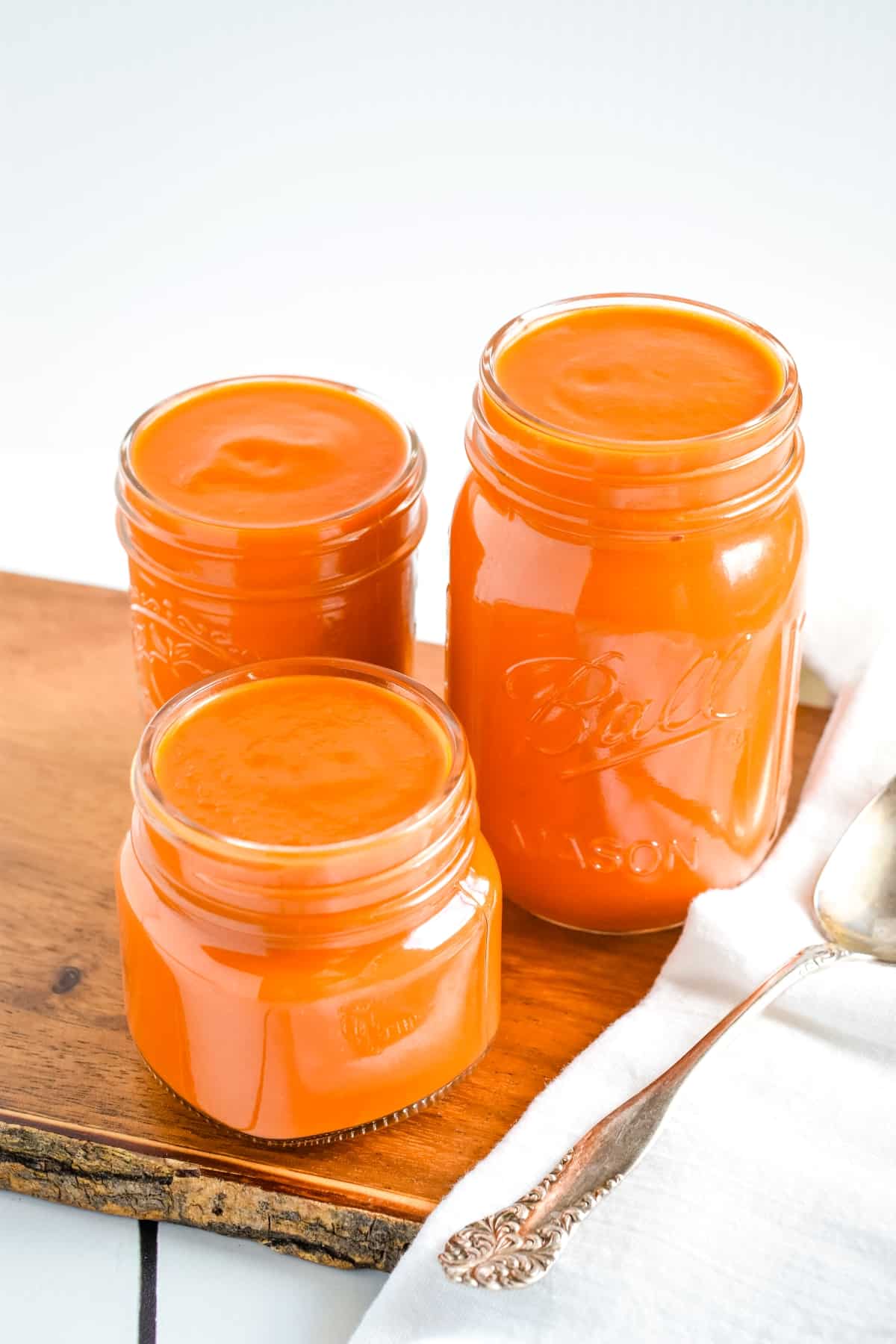 Sauce in Mason jars.