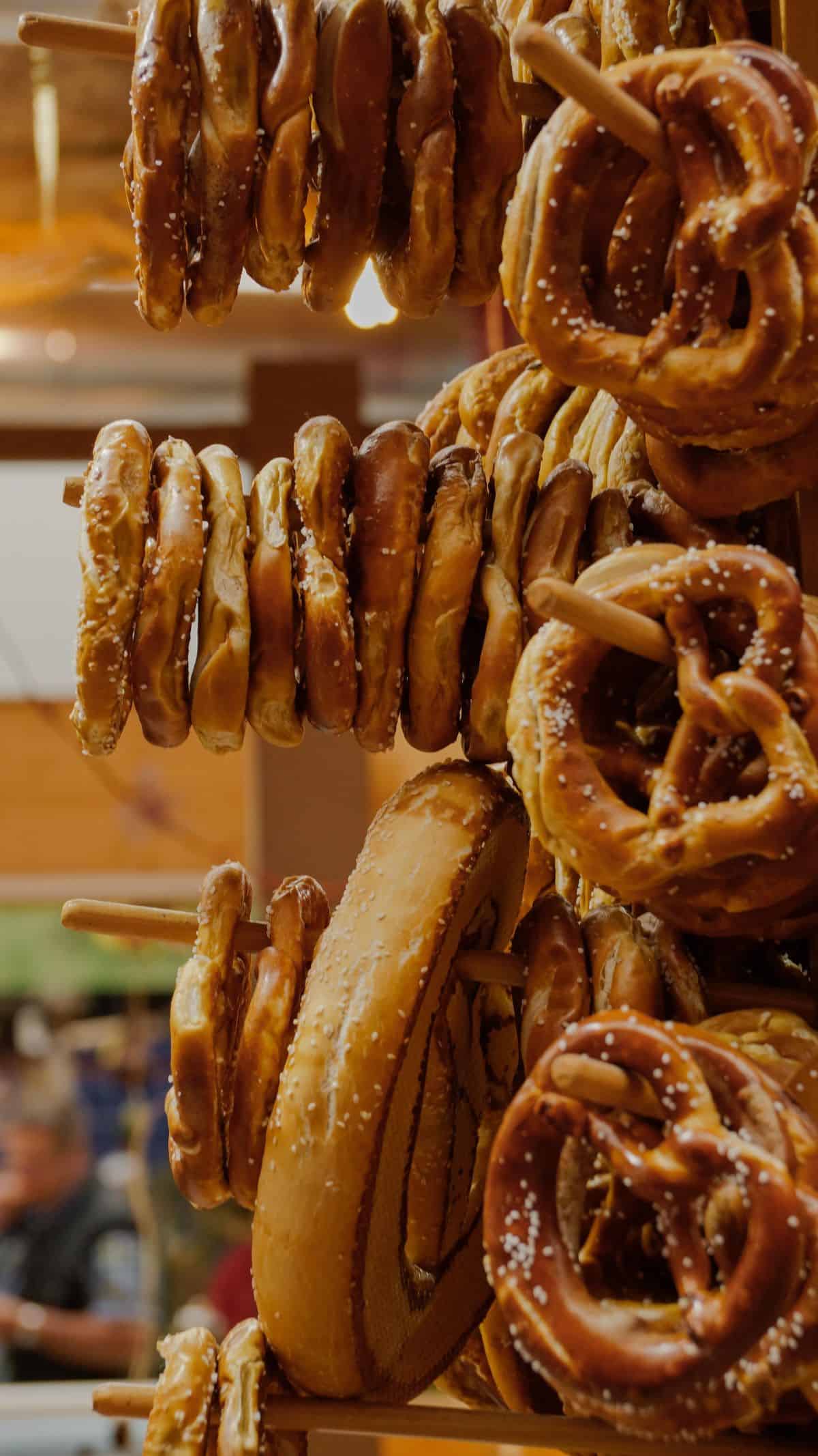 soft pretzels on a wooden rack.