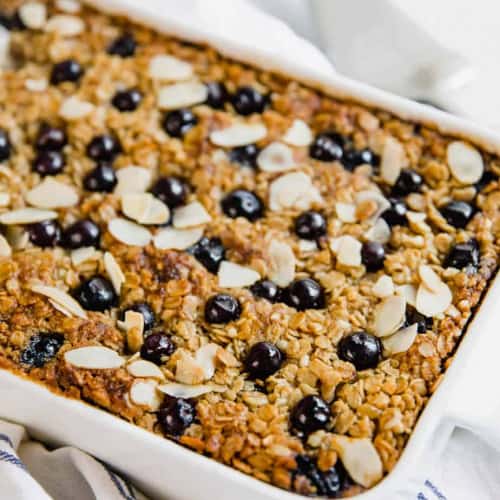 Ultimate blueberry baked oatmeal in baking dish.