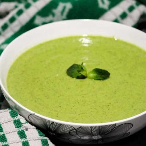 Broccoli pea and mint soup in a bowl.