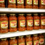 Bertolli Tomato Sauce on supermarket shelves.