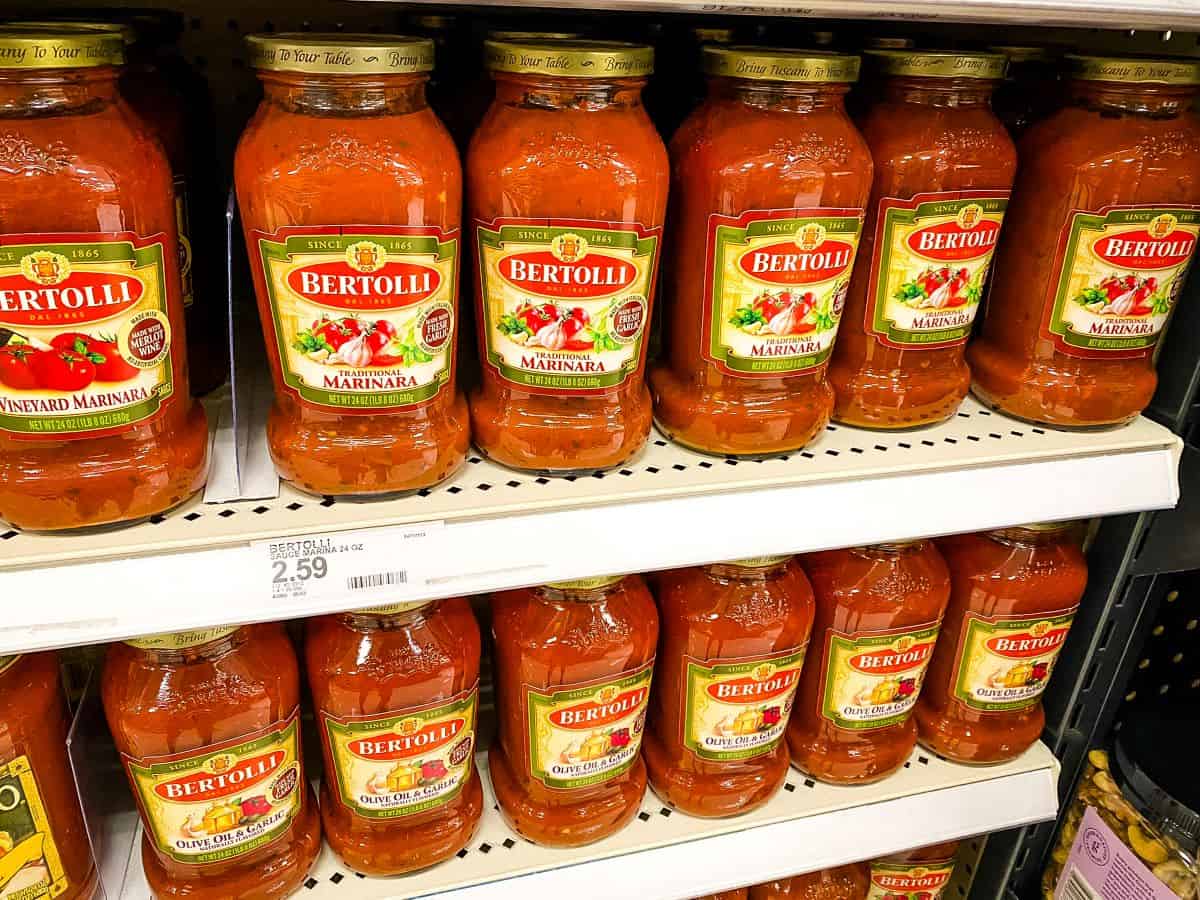 Bertolli Tomato Sauce Olive Oil and Garlic on supermarket shelves.