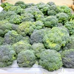 Broccoli in supermarket on ice.