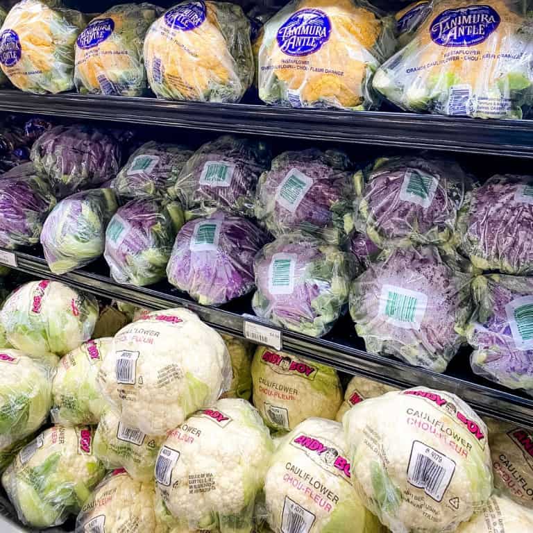 Cauliflower on shelves in supermarket.